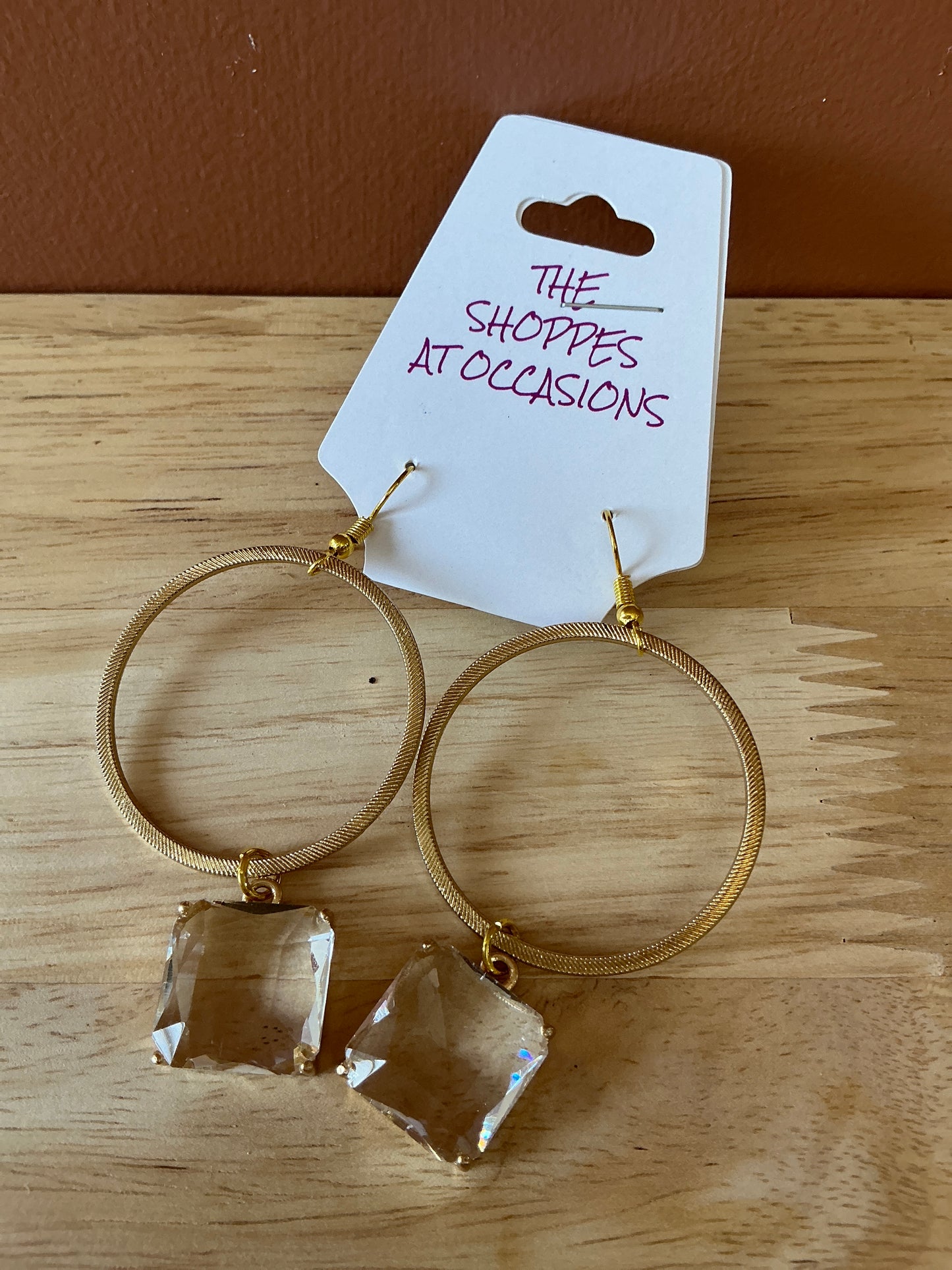 GOLD CIRCLE W/CLEAR DANGLE