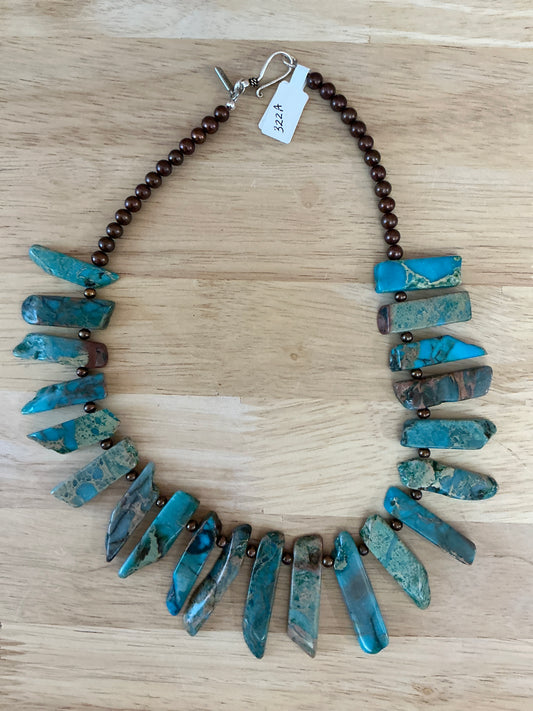 TURQ STICK NECK W/BROWN PEARLS